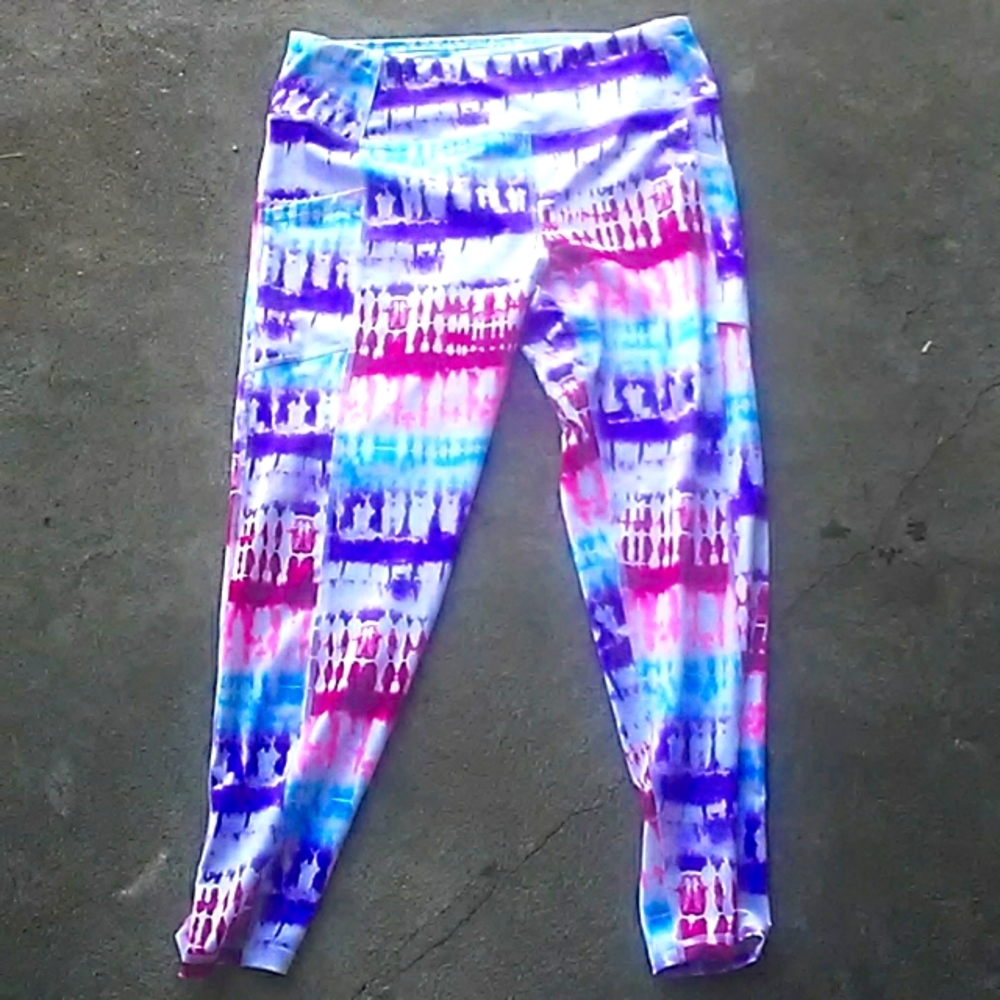 The size is a large the colors are purple pink blue the brand name is Pro Player